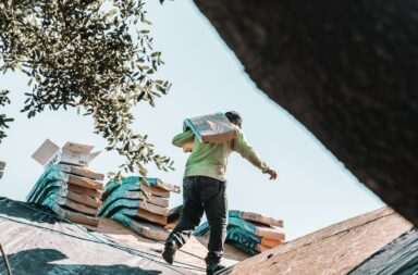 a man riding a skateboard on top of a roof