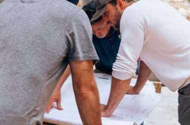 a group of men working on a project